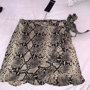 Never worn Nasty Gal crossover skirt